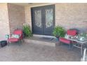 Charming front entrance with brick facade and seating area at 3191 W 151St Ct, Broomfield, CO 80023