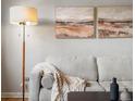 Cozy living room setup with stylish decor, comfortable couch, and warm lighting at 1130 N N Pennsylvania St # 306, Denver, CO 80203