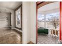 View from hallway to porch with exposed brick at 1944 W 33Rd Ave, Denver, CO 80211