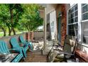 Spacious outdoor patio with seating, great for enjoying the fresh air and community views at 10035 E Mexico Ave, Aurora, CO 80247