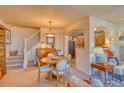 Open dining area adjacent to kitchen and living space; bright and inviting at 494 Black Feather Loop # 117, Castle Rock, CO 80104