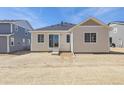 A view of the backyard with sliding glass doors at 4066 N Irvington St, Aurora, CO 80019