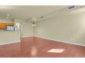 Spacious living room boasts hardwood floors, recessed lighting, and neutral paint, perfect for modern living at 3223 Iron Forge Pl # 108, Boulder, CO 80301