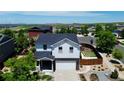 Aerial view of the home with a putting green in the backyard at 25097 E Lake Dr, Aurora, CO 80016