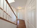 Hardwood floors, white walls, and a staircase leading upstairs at 246 Rockview Dr, Superior, CO 80027