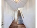 Hardwood floors and a staircase leading to the upper level at 246 Rockview Dr, Superior, CO 80027