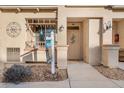 Townhome's front entrance with a for sale sign at 833 E 98Th Ave # 204, Thornton, CO 80229