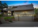 Charming home with attached garage, second story deck and well maintained terraced landscaping at 5812 Irish Pat Murphy Dr, Parker, CO 80134