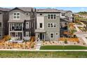Charming home with a well-maintained front yard and inviting curb appeal in a neighborhood setting at 15020 Cast Pebble Cir, Parker, CO 80134