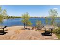 Scenic view of the beach, lake and picnic tables at 10970 W Florida Ave # 225, Lakewood, CO 80232