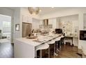 Modern, eat-in kitchen with stainless steel appliances and sleek countertops at 3030 Wilson Ct # 5, Denver, CO 80205