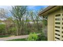 Balcony overlooking paved path with greenway and river in the distance at 655 S Alton Way # 8D, Denver, CO 80247