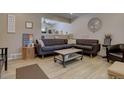 Stylish living room featuring trendy decor, comfortable seating, and plenty of natural light at 3766 S Nelson Way, Denver, CO 80235