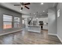 Spacious living room with hardwood floors and open floor plan at 8668 E 54Th Pl, Denver, CO 80238