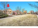 Residential neighborhood featuring a well-maintained lawn and inviting curb appeal at 23317 E Saratoga Cir, Aurora, CO 80016
