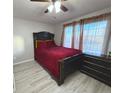 Bright bedroom with plush carpet and large windows at 2683 S Carson Way, Aurora, CO 80014