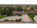 Ranch home situated on a large lot with a view at 14121 Countryhills Dr, Brighton, CO 80601