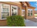 Charming home exterior with a well-maintained front yard and inviting entryway at 5895 S Taft Ct # H, Littleton, CO 80127