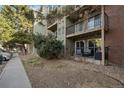 Charming condo with a patio area and black metal railings offering a cozy outdoor space at 4899 S Dudley St # 3A, Littleton, CO 80123