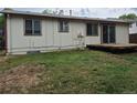 Backyard features a lush lawn with potential for outdoor enjoyment and relaxation at 2832 S Mobile St, Aurora, CO 80013