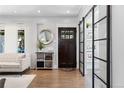 Elegant entryway with a dark wood door and glass panels at 885 S Sherman St, Denver, CO 80209