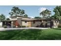 A modern home's exterior featuring a two-car garage, a flat roof, and a well-manicured lawn, perfect for suburban living at 1721 Arrowpoint Ct, Franktown, CO 80116