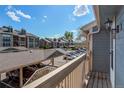 View from the balcony, featuring ample parking and surrounding apartment buildings at 2690 E Otero Pl # 7, Centennial, CO 80122