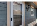 Close-up of the front door, showcasing the exterior paint and hardware at 2690 E Otero Pl # 7, Centennial, CO 80122