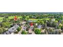 Desirable neighborhood with mature trees, water features, and golf course views at 360 Morning Star Ln, Lafayette, CO 80026