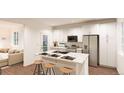 Modern kitchen with island, stainless steel appliances, and white cabinetry at 22321 E 38Th Pl, Aurora, CO 80019