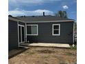 Back exterior of the home with a concrete patio, perfect for outdoor relaxation and entertainment at 1100 N Hanover St, Aurora, CO 80010