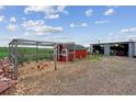 Features a chicken coop, shed, and rustic country charm, with ample space for raising poultry and storage at 3559 Meadow Ln, Brighton, CO 80603