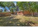 Spacious backyard with a fence and plenty of room for outdoor activities at 334 S Revere St, Aurora, CO 80012