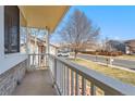 View from the porch, overlooking the street and the surrounding neighborhood at 13463 Quivas St, Westminster, CO 80234