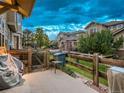 Private backyard with a concrete patio and a wooden fence at 7648 S Sicily Way, Aurora, CO 80016