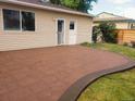 Spacious stamped concrete patio provides a versatile outdoor entertaining space in a well-maintained backyard at 3150 Kassler Pl, Westminster, CO 80031