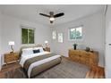 Cozy main bedroom with natural light, hardwood floors, and neutral decor for a serene retreat at 6765 W 33Rd Ave, Wheat Ridge, CO 80033