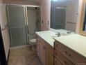Bathroom with a toilet, sink, vanity, tile floor and shower at 431 S Kalispell Way # 308, Aurora, CO 80017