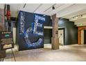 Welcoming entrance area featuring unique Ice-themed decor and signage, enhancing the building's character at 1801 Wynkoop St # 208, Denver, CO 80202