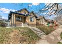 Beautifully maintained brick home with a well-manicured front yard at 2663 King St, Denver, CO 80211