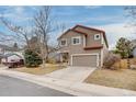 Inviting two-story home with a two-car garage and freshly painted exterior at 11213 Vilas St, Parker, CO 80134