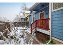 Home exterior featuring the front porch, walkway, and blue siding with white trim at 1605 17Th St, Boulder, CO 80302
