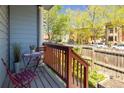 Cozy porch with table and chairs, perfect for relaxing and enjoying the neighborhood views at 1605 17Th St, Boulder, CO 80302