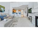 Open floor plan featuring a seamless flow from the living area to the kitchen with bar stool seating at 3425 W 111Th Loop # B, Westminster, CO 80031