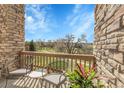 Relaxing balcony with scenic views and comfortable seating at 23965 E Kettle Pl, Aurora, CO 80016