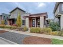 Attractive modern home with well-kept landscaping and a stylish front entrance at 10630 E 26Th Ave, Aurora, CO 80010