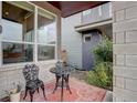 Cozy front porch with outdoor seating and an inviting atmosphere at 10630 E 26Th Ave, Aurora, CO 80010