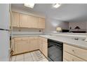 Light wood kitchen cabinets, gray countertops, and stainless steel appliances at 1695 Carr St # B, Lakewood, CO 80214
