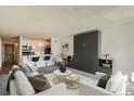 Comfortable living room with bar seating and built in storage at 1020 15Th St # 20F, Denver, CO 80202