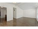 A living room featuring wood flooring and a spacious layout at 2565 Gray St, Edgewater, CO 80214